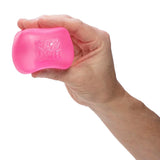 NeeDoh Nice Cube squishy i pink holdt i hånden