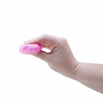 NeeDoh Swirl Groovy Glob squishy i hvid og lyserød, set fra siden